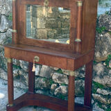 A small piece of Bonheur du jour with detached columns in Empire-era mahogany.