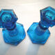 2 blue glass doll candlesticks