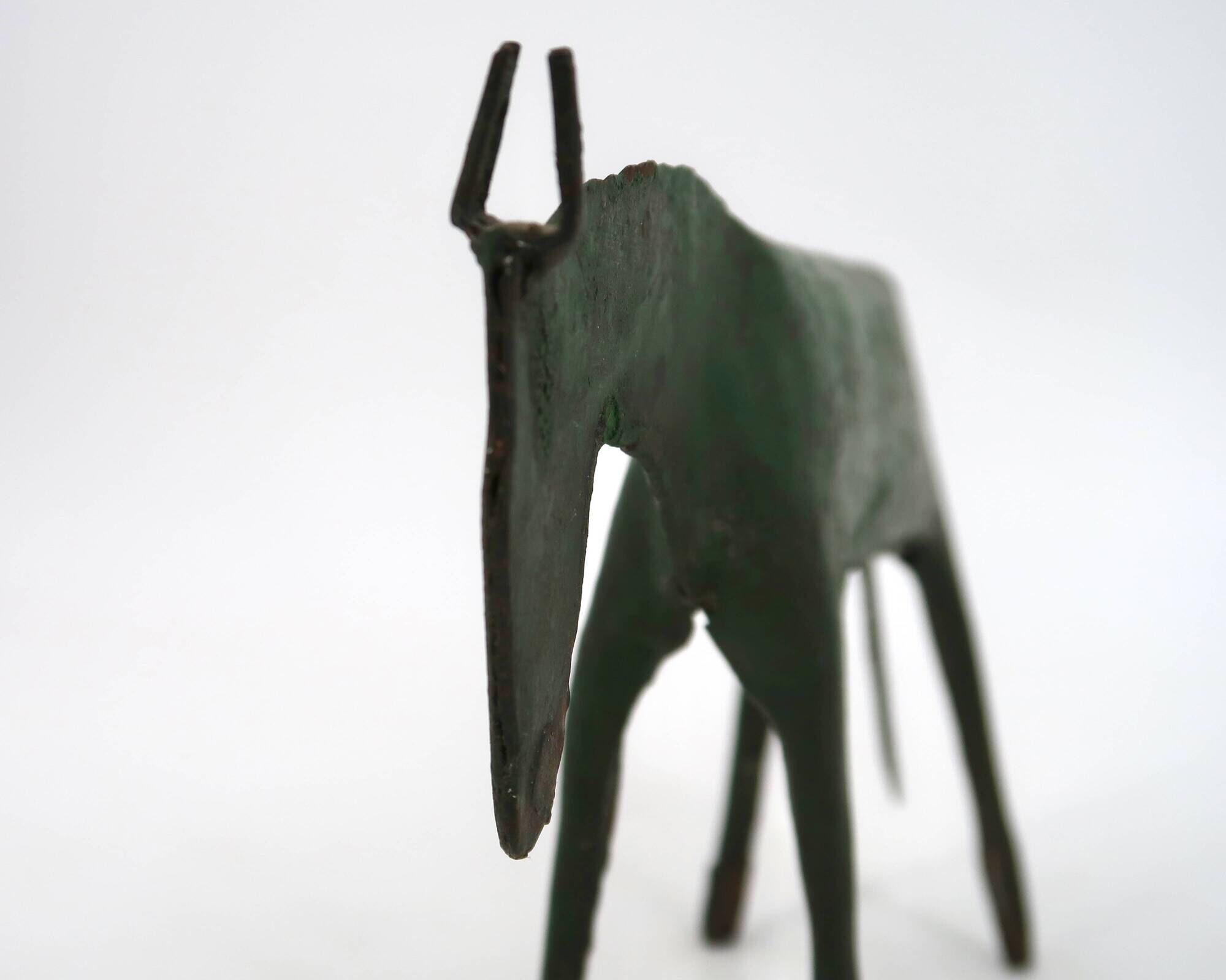 Sculpture of a dark green patinated metal horse, 1980s.