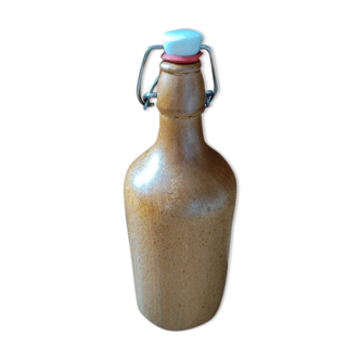 Bottle in glazed stoneware varnish