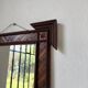 Pair of wooden mirrors in tramp art style