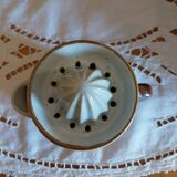 Lemon squeezer and its vintage ceramic pot