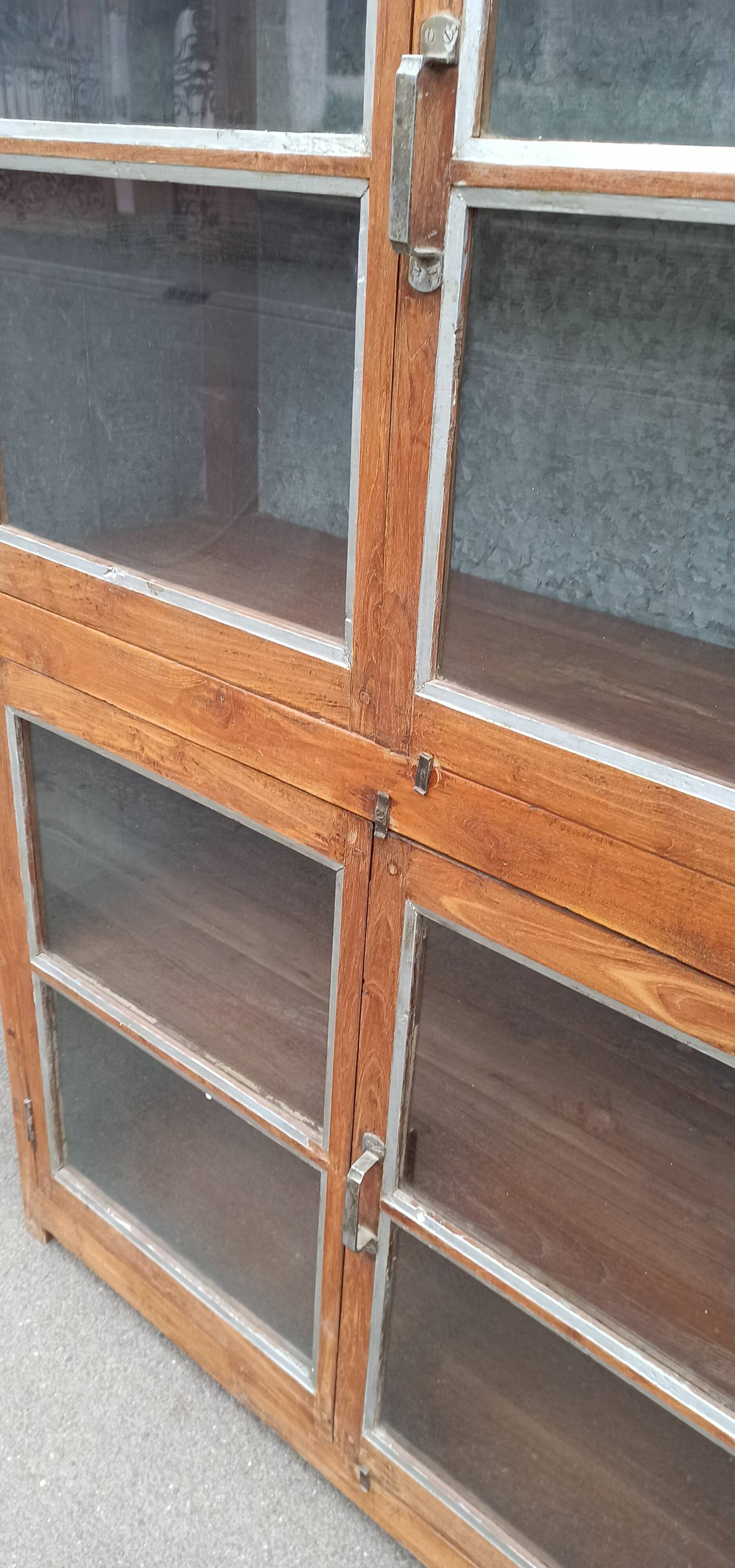 Old glass cabinet in wood and metal