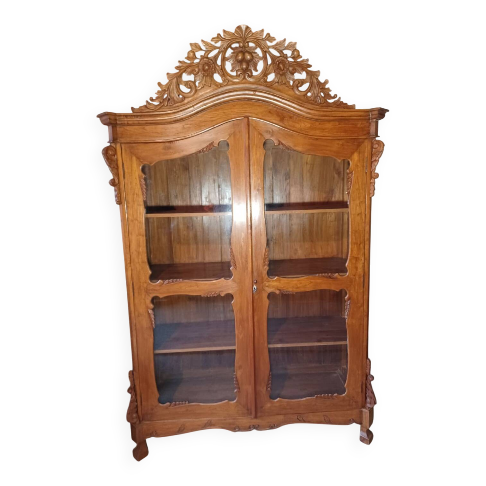Large glass and carved cabinet