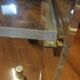 David Lange designer coffee table, plexiglass and gold metal, sliding top