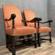 Pair of Louis XIII style armchairs in carved walnut circa 1850