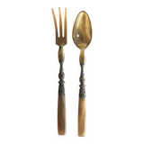 Old corn and silver salad cutlery
