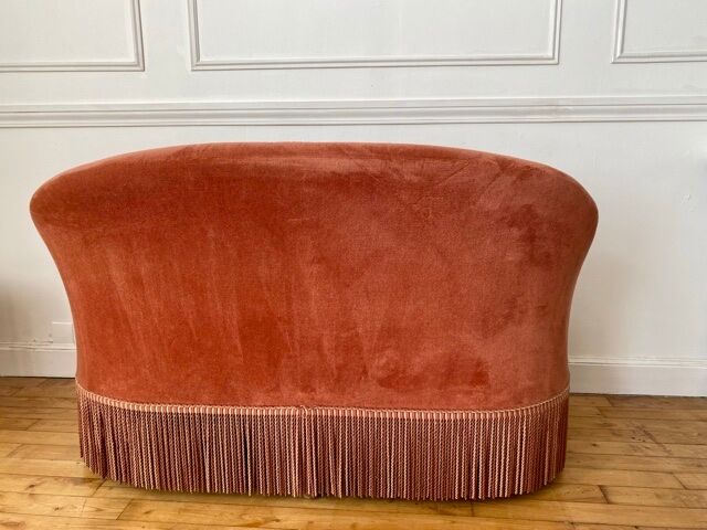 Pink velvet sofa
