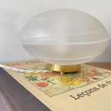 Vintage desk table lamp in antique glass with a brass base.