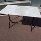 Table de bistrot en marbre pied en fer