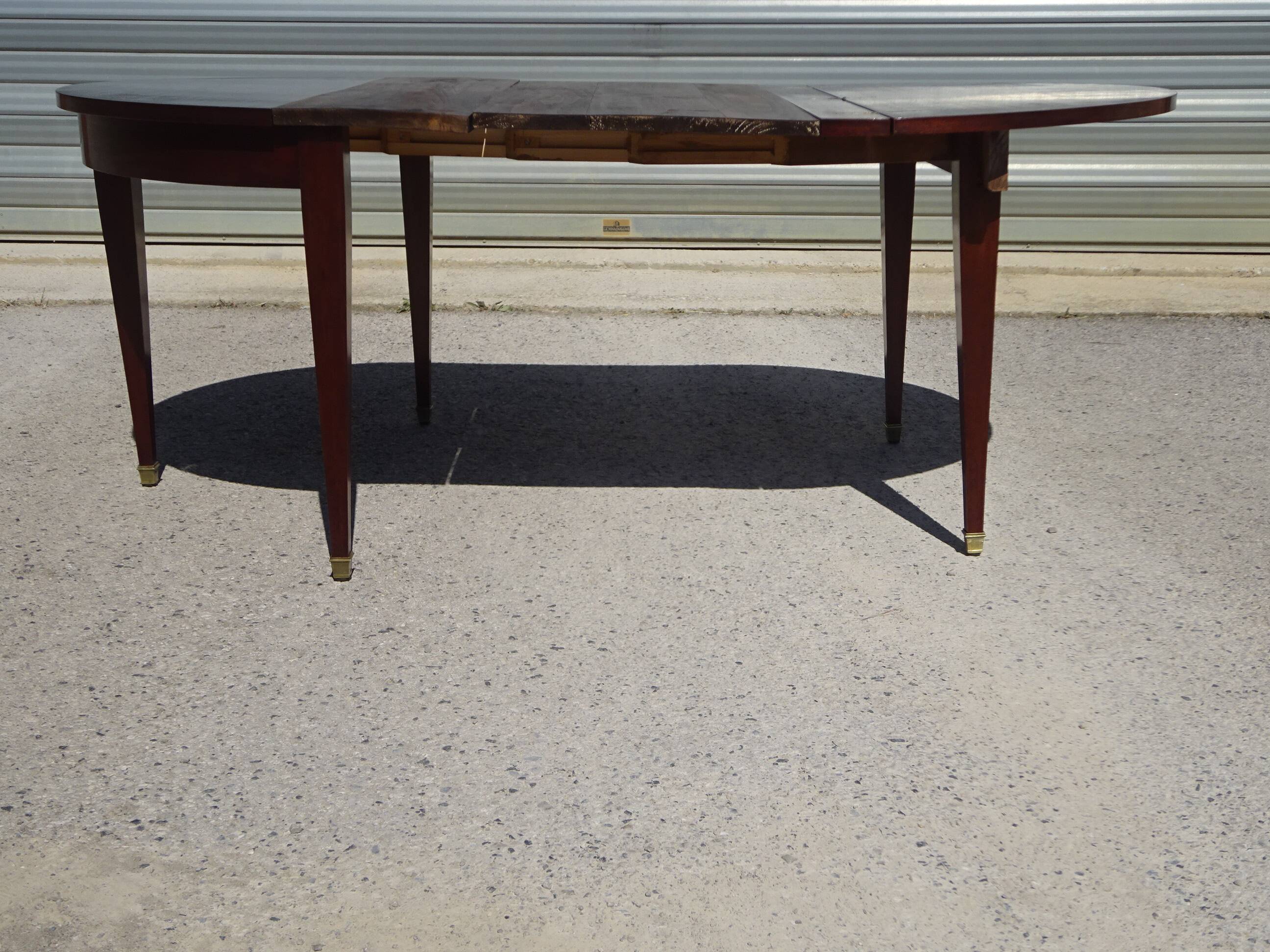 Half-moon console table, extendable in Empire style.