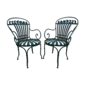 Pair of wrought iron garden chairs by François Carre