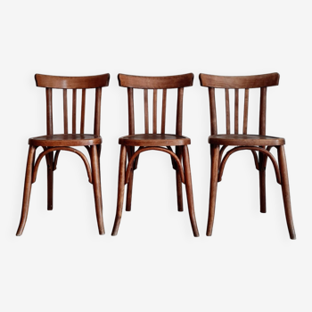 Suite de 3 chaises bistrot anciennes en bois