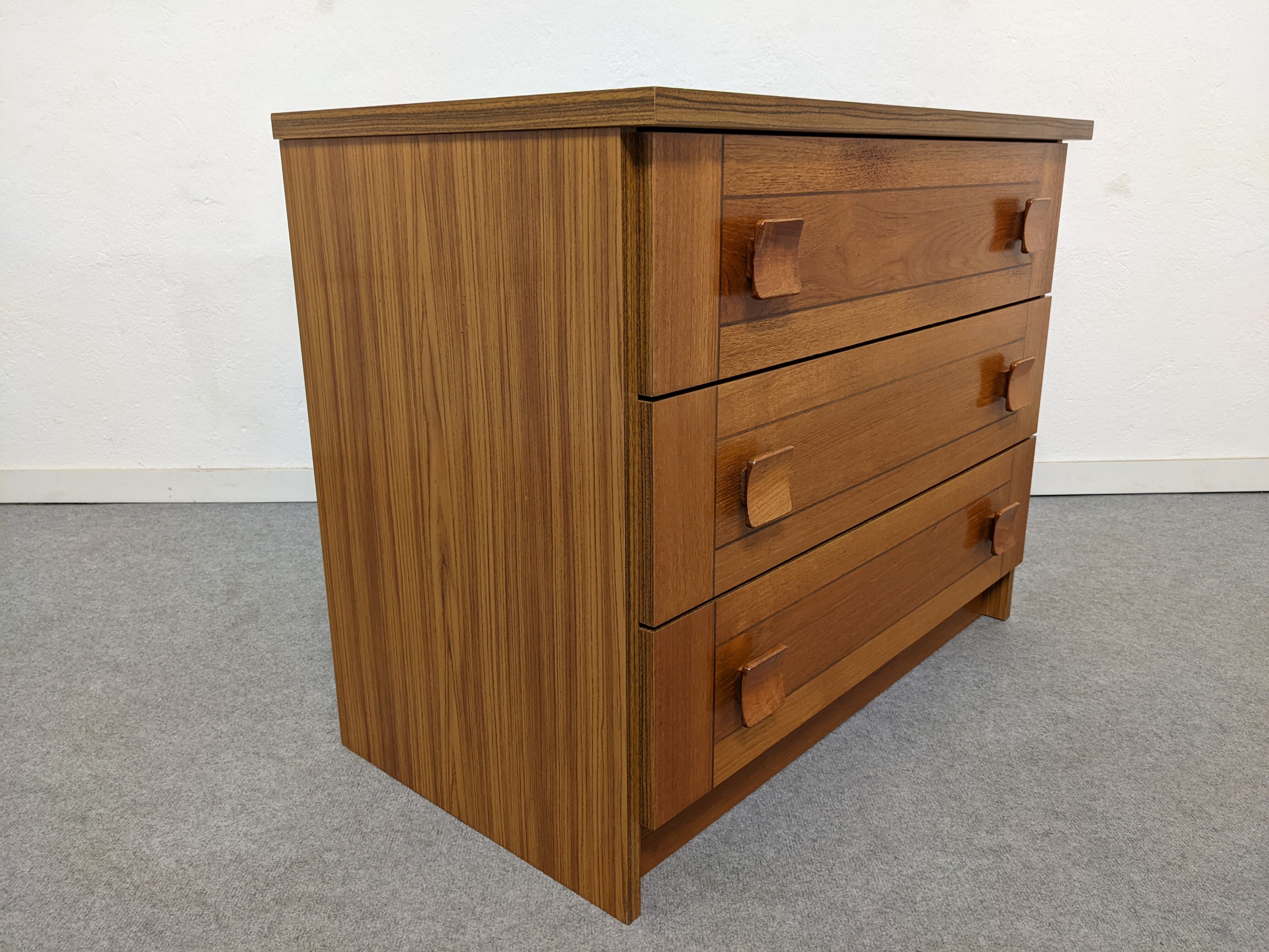 Vintage teak and rosewood chest of drawers from the 70-80s