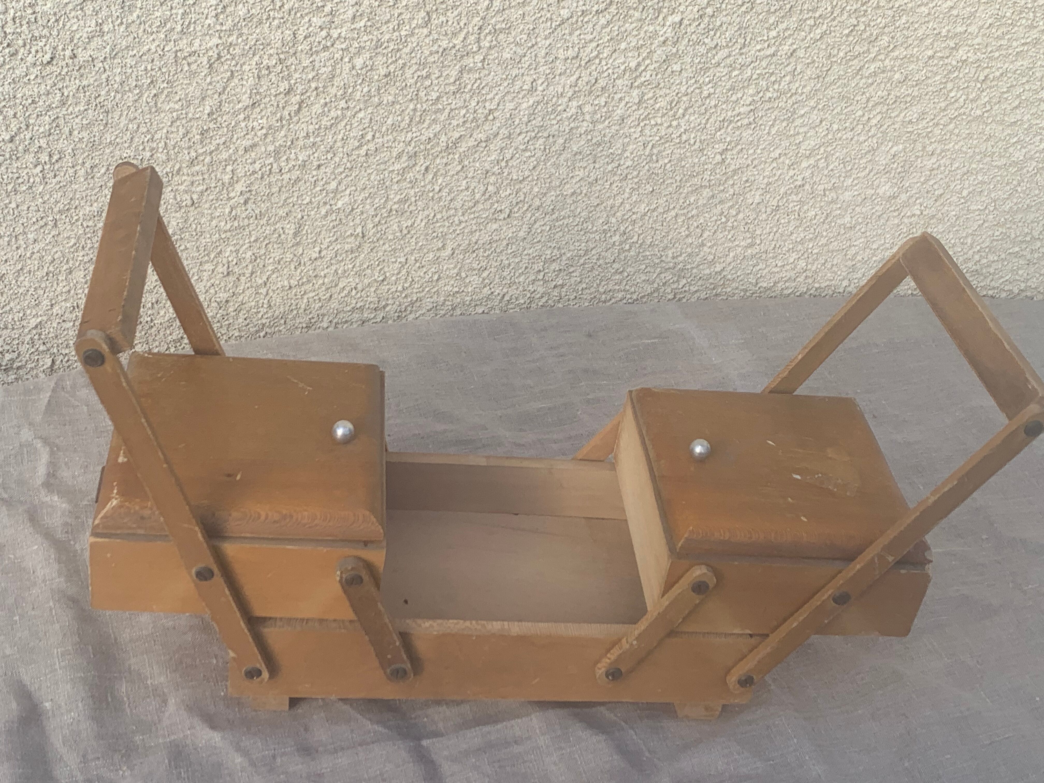 Sewing box in old varnished wood