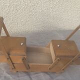 Sewing box in old varnished wood