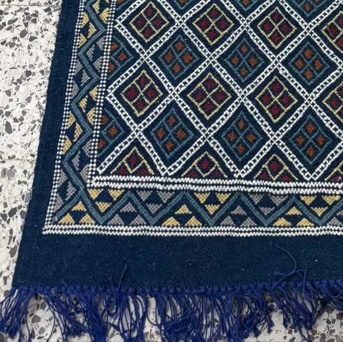 Hand-woven blue hallway rug in natural wool