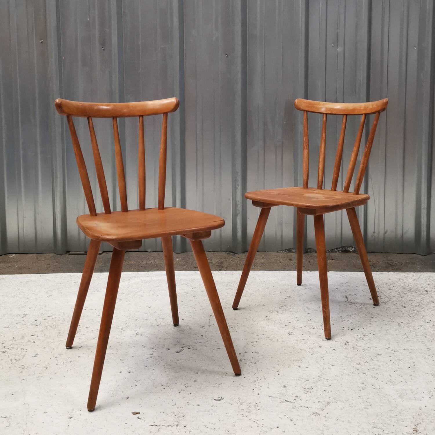 Pair of bistro chairs with bars
