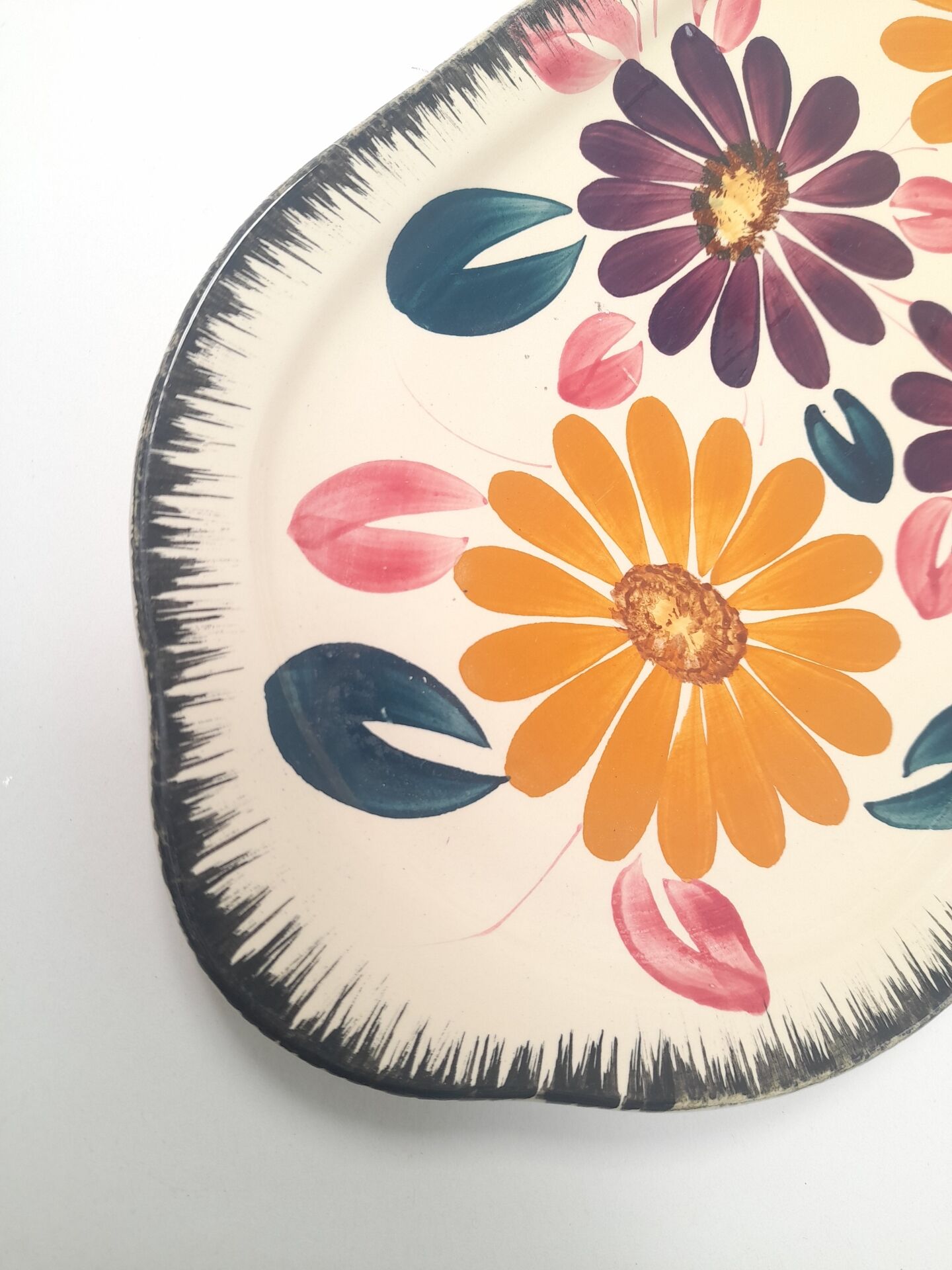 Floral cake dish in Boch brothers earthenware