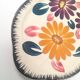 Floral cake dish in Boch brothers earthenware