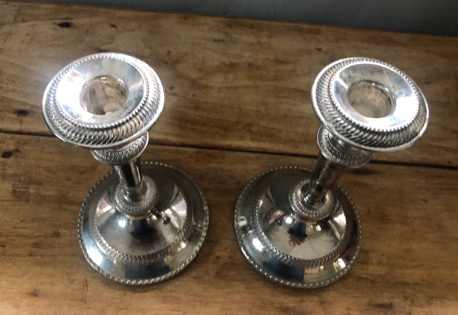 Silver metal candle holders that can be paired.
