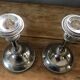 Silver metal candle holders that can be paired.