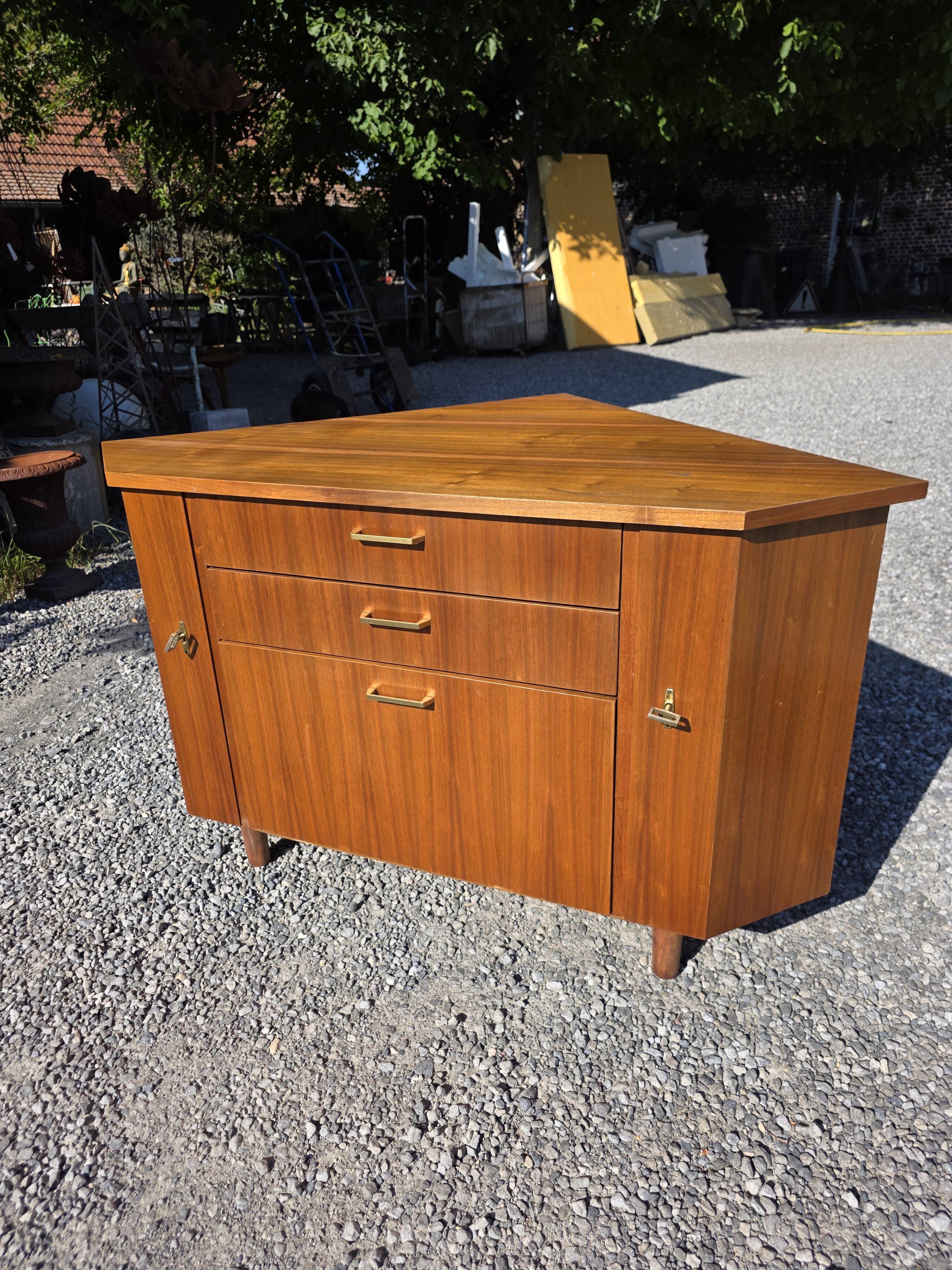 Scandinavian corner unit in teak from the 1960s.