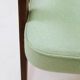 Pastel pistachio wool fabric Scandinavian armchair, oak wood.