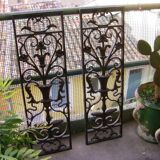 Pair of wrought iron door grilles from Dammarie