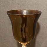 Photophore in tinted glass on high metal foot with silver patina