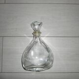 Triangular whiskey bottle
