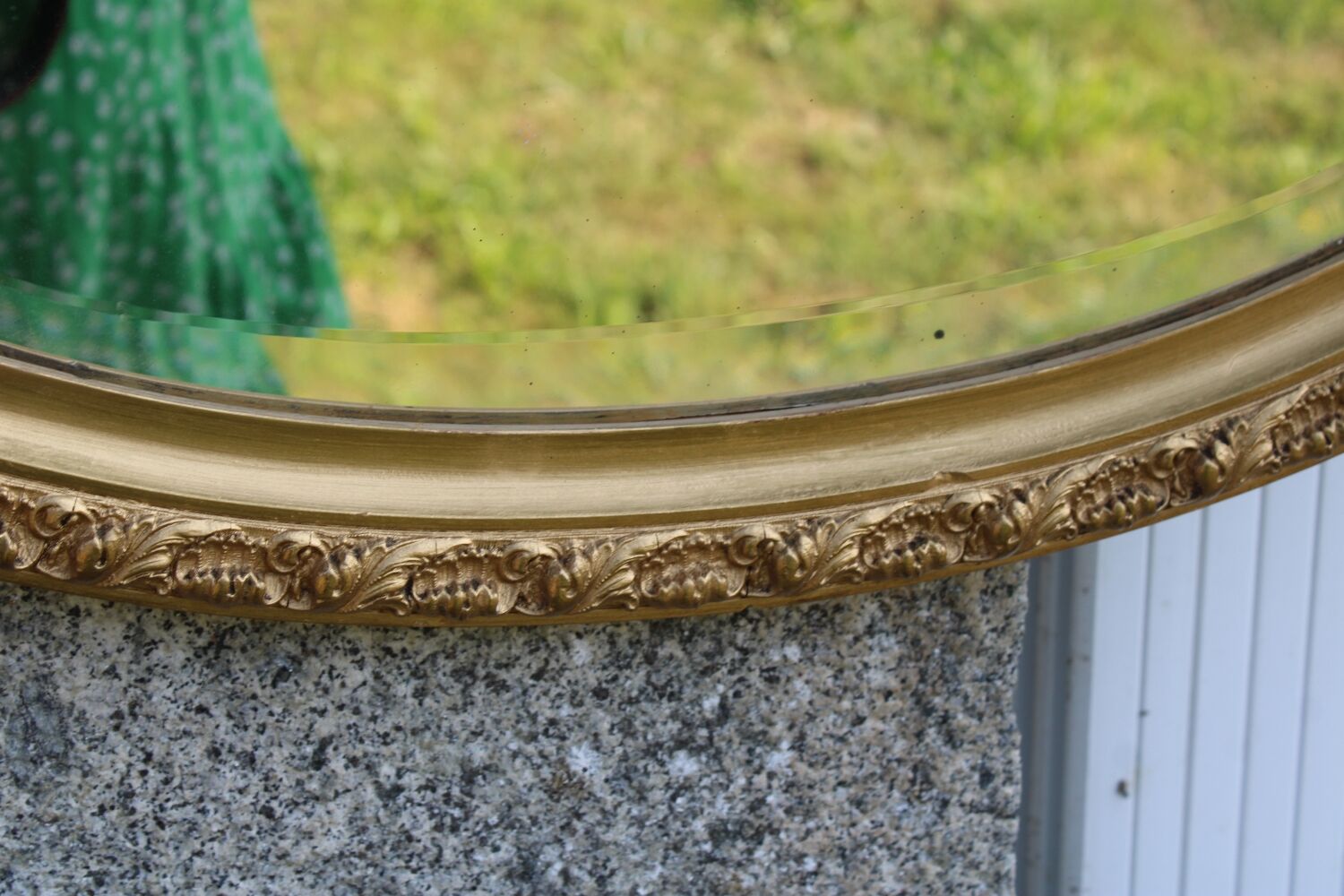 Bevelled oval antique mirror