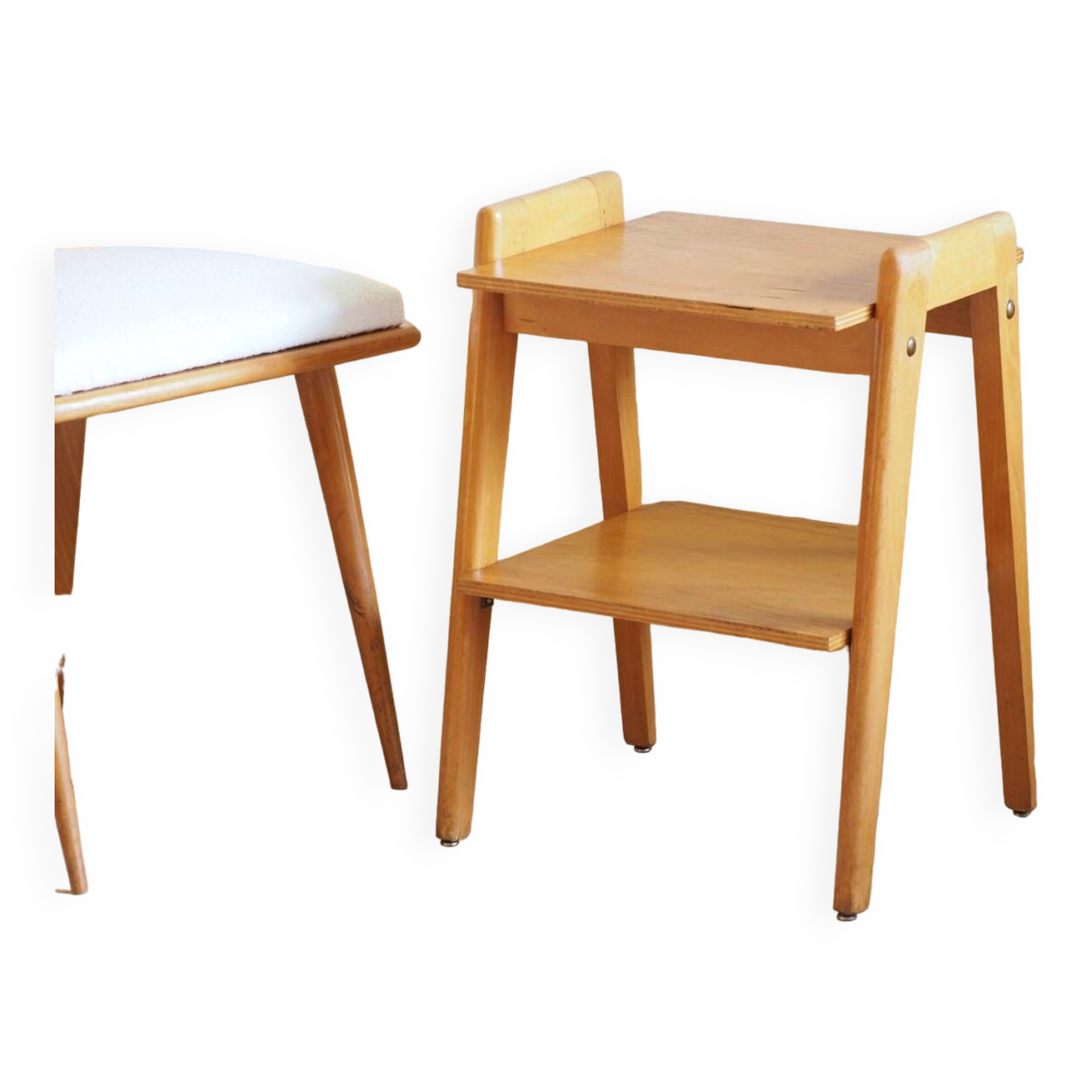 Bedside or side table with compass legs.