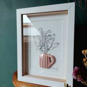 Composition of a bouquet of lily of the valley in a clay mug