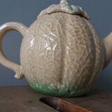 Teapot coffee maker pitcher melon in slippery water