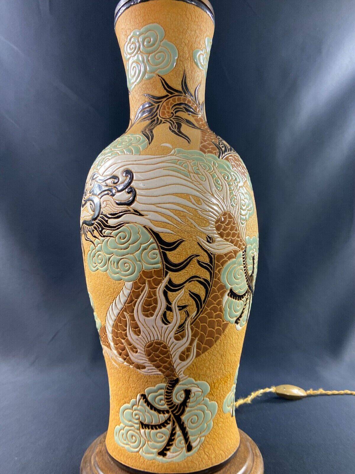 Very large dragon lamp on a yellow background in well-fired Vietnamese stoneware.