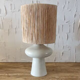 Tadelakt lamp with raffia lampshade