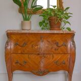 Louis XV style curved chest of drawers in marquetry