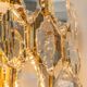 Pair of wall sconces in gilded brass and crystal by Palwa, Germany, 1970s.