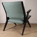Vintage armchair from the 1960s in black wood and fabric.