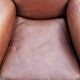 Paire de fauteuils club en cuir brun des années 30