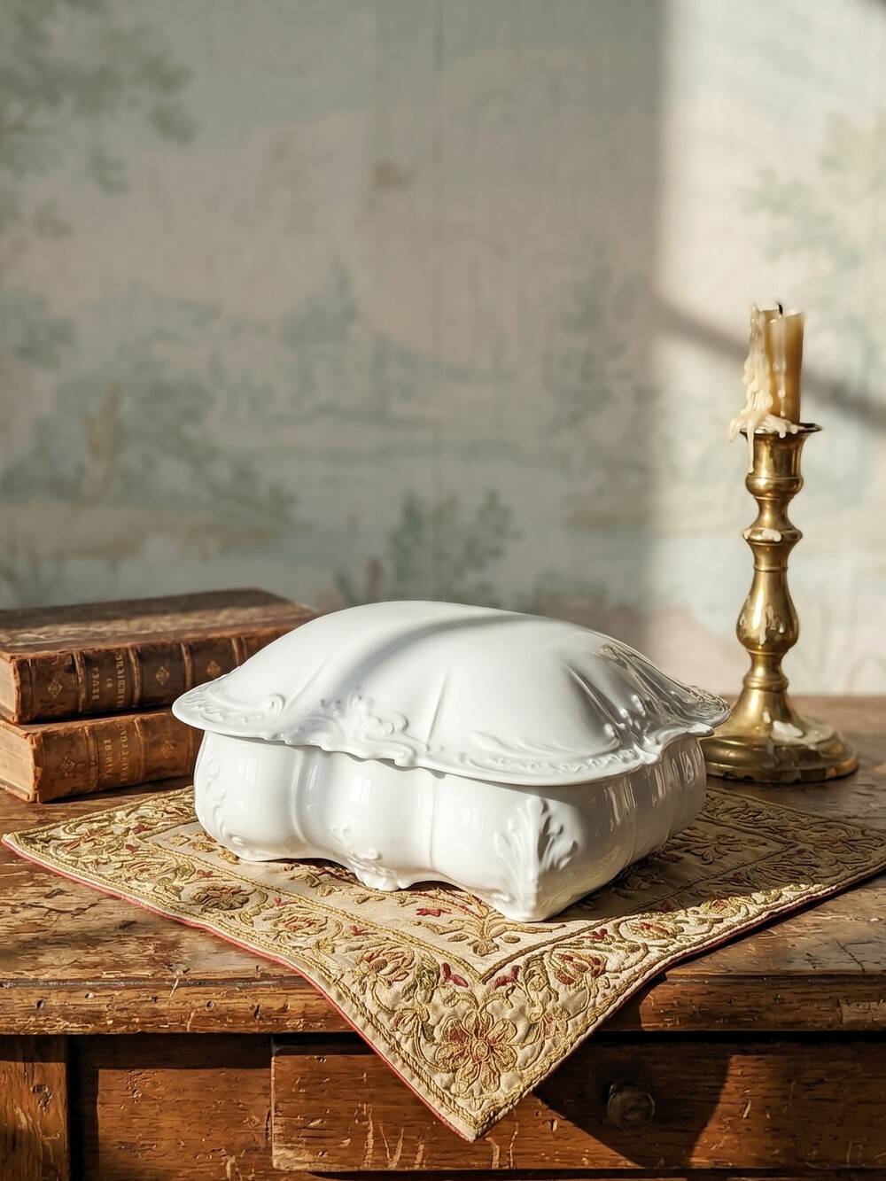 Vintage Limoges porcelain bonbonnière in white with rococo decoration.