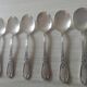 Set of 6 small silver metal spoons