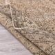 Tapis vintage en laine et coton beige au design floral