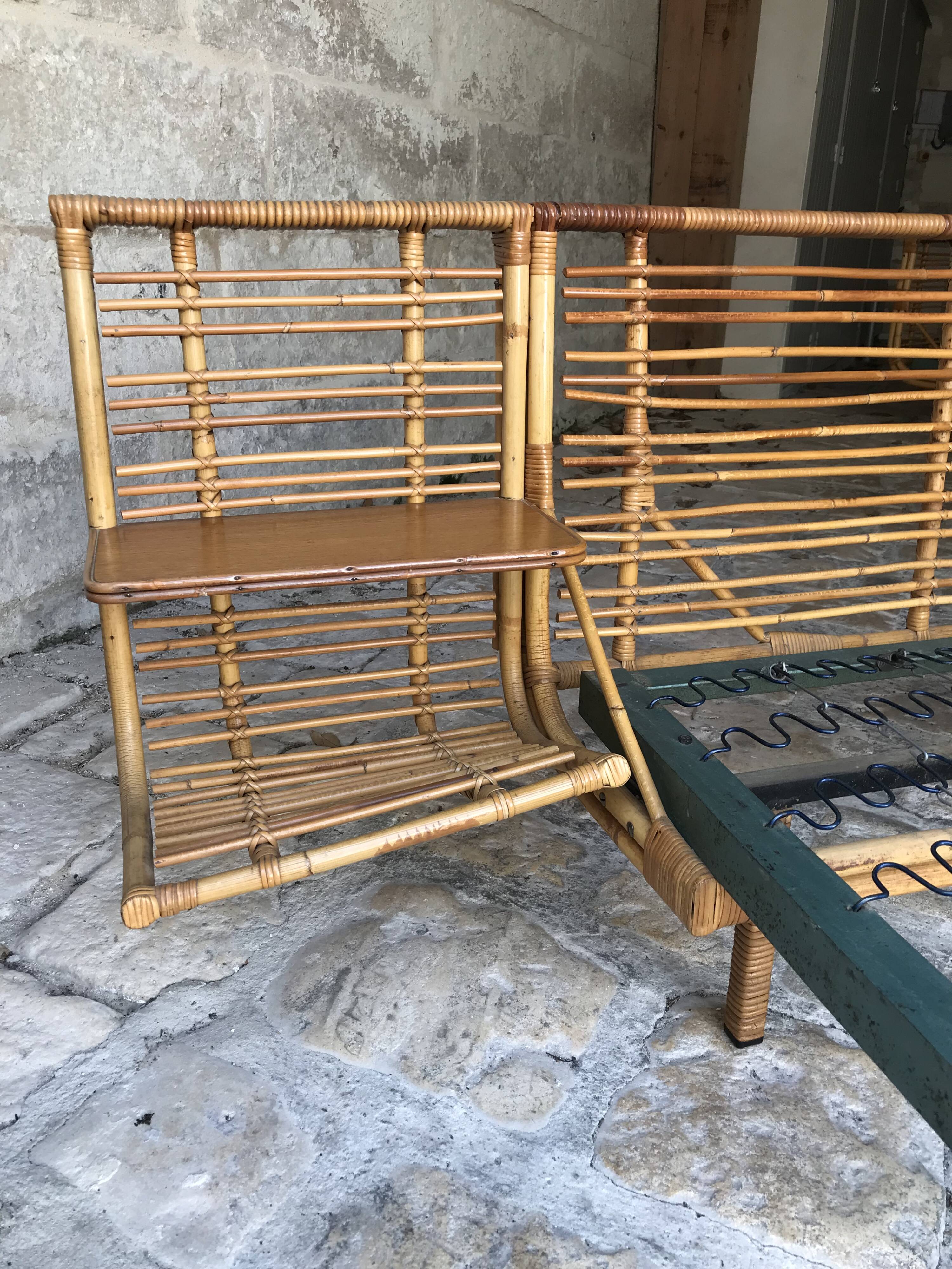 Twin rattan beds with built-in bedside tables