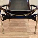 Set of 2 black leather and chrome reclining chairs designed by Hans Eichenberger.