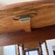 Walnut table with 6 legs and 2 extensions.