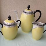 Coffee pot or teapot, sugar bowl and milk jug in porcelain.