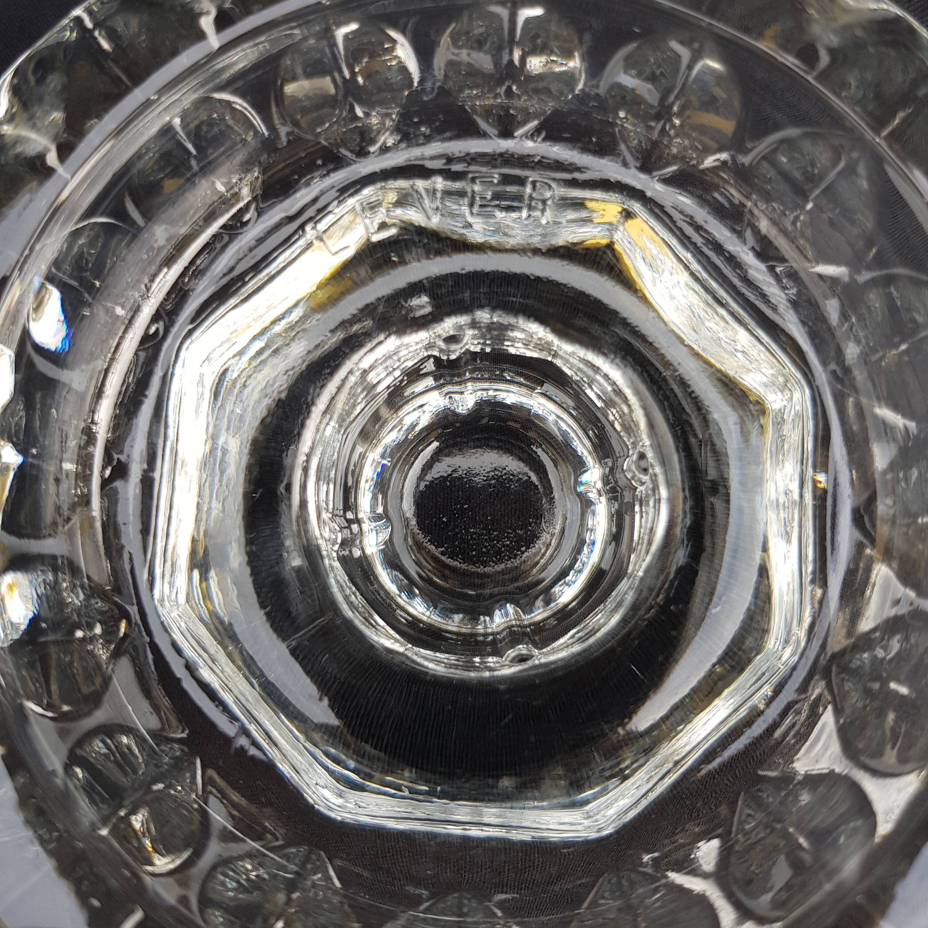 Duo of old glass candlesticks