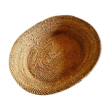 Basket in braided wicker and rattan